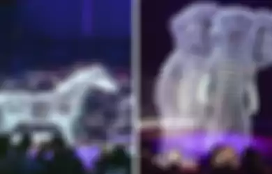 Salah satu bagian pertunjukan hewan hologram dalam Sirkus Roncalli di Jerman yang menampilkan hologram gajah dan kuda sedang beratraksi..