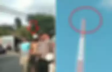 Aksi nekat pemuda yang mencoba bunuh diri dengan memanjat tower telekomunikasi setinggi 75 meter, Senin (8/7/2019).