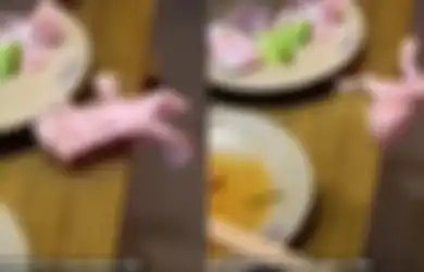 Bagai Zombie, Potongan Daging Mentah Ini Melompat dari Piring Sampai Bikin Orang Teriak