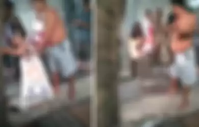 Video penangkapan ular sanca oleh warga di Rawa Binong, Lubang Buaya Jakarta Timur, Rabu (24/7/2019) 