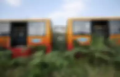  Ratusan bus Transjakarta terbengkalai di Kecamatan Dramaga, Kabupaten Bogor, Jumat (26/7/2019).