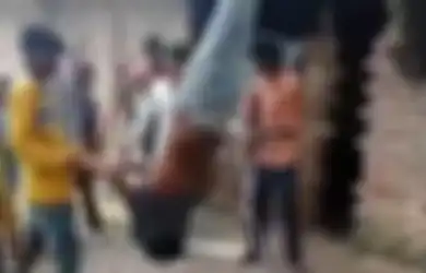 Memilukan, Seorang Pria Tak Bersalah Digantung Kakinya Kemudian Dicambuki, Ini Kenyataan di Baliknya