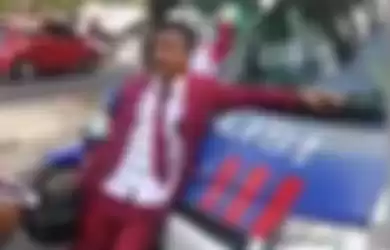 Viral Video Seorang Anak Berseragam Merah Putih Tak Mau Ditilang dan Malah Tantang Polisi Serta Banting Helm: 'Kenapa Tidak Ada Keadilan Bagi Saya!'