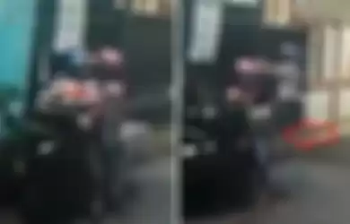 Rekaman aksi pencurian pasangan suami istri yang membawa dua anak balita (panah merah).