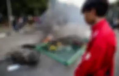 Pelajar melakukan Aksi Tolak RUKHP di Belakang Gedung DPR/MPR, Palmerah, Jakarta Barat, Rabu (25/9/2019). 