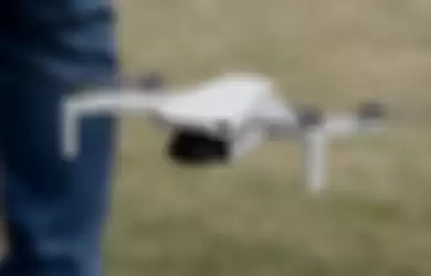 Drone  DJI Mavic Mini terbang