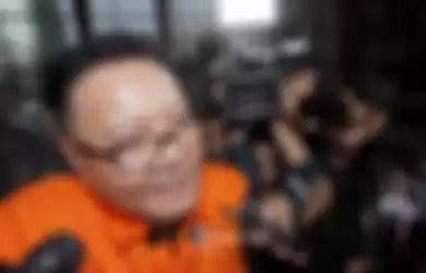 Anggota DPR RI I Nyoman Dhamantra mengenakan rompi tahanan usai menjalani pemeriksaan di Gedung KPK, Jakarta, Jumat (9/8/2019).