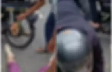 Warga mendokumentasikan tragedi ketika seorang perempuan setengah baya diduga jatuh dari motor akibat roknya melilit gir motor yang ditumpangi. Peristiwa terjadi di Wates, Kulon Progo, Daerah Istimewa Yogyakarta.