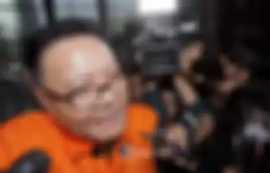 Anggota DPR RI I Nyoman Dhamantra mengenakan rompi tahanan usai menjalani pemeriksaan di Gedung KPK, Jakarta, Jumat (9/8/2019).