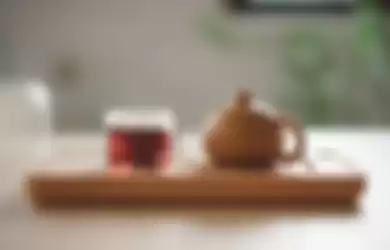 Ilustrasi secangkir teh hangat