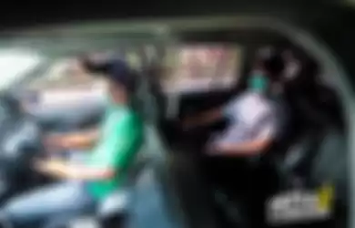 Armada khusus GrabCar yang dibuatkan pembatas antara pengemudi dengan penumpang.