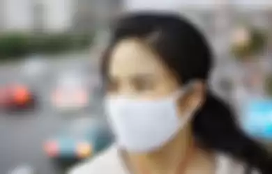 Cara menggunakan masker kain dengan benar untuk mencegah virus Corona.