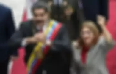 Presiden Venezuela Nicolas Maduro dan istrinya, Cilia Flores.