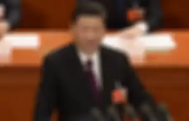 Presiden China Xi Jinping saat menyampaikan pidato di hadapan Kongres Rakyat Nasional di Beijing, 20 Maret 2018.