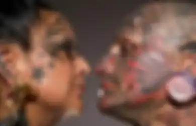 Kepala Dibuat Mirip Bak Alien dan 90% Tubuhnya Ditato, Inilah Pasangan dengan Rekor Modifikasi Tubuh Terbanyak di Dunia
