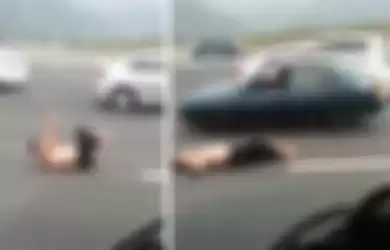 Pria yang nekat berolahraga yoga di tengah jalan tol.