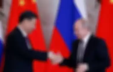 Presiden China Xi Jinping dan Presiden Rusia Vladimir Putin.
