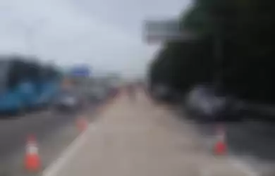 Jalan tol Jagorawi arah Jakarta, ada pengerjaan (19/3/2021).