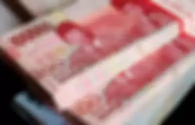 Ilustrasi uang. Bantuan pemerintah Rp 400 miliar dibagikan dua minggu lagi, siap-siap serbu ATM.