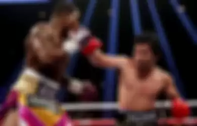 Manny Pacquiao (kanan) saat menghadapi Adrien Broner tahun 2019