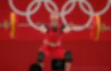 Aksi lifter putri Indonesia, Windy Cantika Aisah pada Olimpiade Tokyo 2020, Sabtu (24/7/2021)