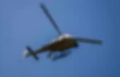Ilustrasi sebuah helikopter mendarat di dekat acara pernikahan terekam kamera foto. Video ini membuat netizen ngakak. 