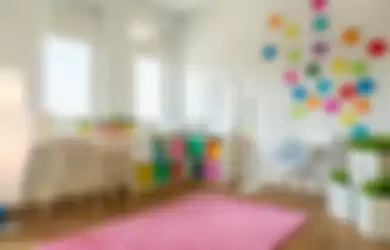 Ilustrasi area belajar dan bermain di kamar anak. 