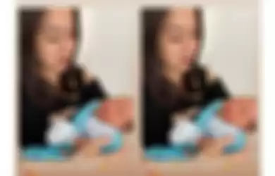 Tante Ernie menggendong cucu pertamanya, Kamis (23/12/2021)