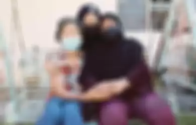 Foto anak TKI yang dirawat wanita beda agama  viral. Itu sebabnya, masalah Rohana Abdullah mengundang perhatian publik juga pejabat Malaysia.