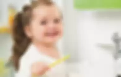 Ilustrasi anak yang sedang sikat gigi