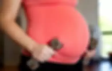 Ilustrasi ibu hamil sedang berolahraga