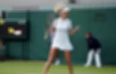 Petenis Katie Boulter kenakan dress Premier Slam Nike di pertandingan Wimbledon.