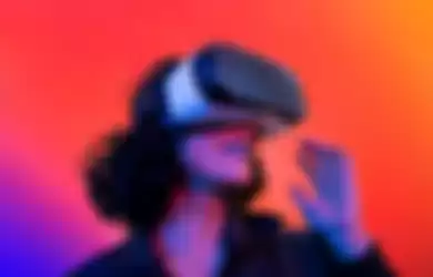 Ilustrasi penggunaan headset AR/VR yang akan dirilis Apple pada Juni 2023. 