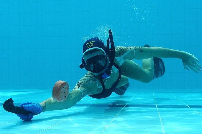 GOLD COAST, AUSTRALIA - JANUARY 26: Kate Boulus of Queensland poses for a photograph during the 2014 Australian Underwater Hockey Championships at Palm Beach Aquatic Centre on January 26, 2014 on the Gold Coast, Australia. (Photo by Matt Roberts/Getty Images)