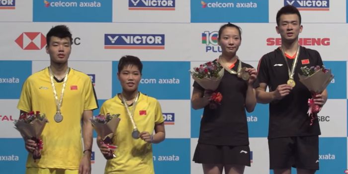 Wang Yilyu/Huang Dongping (jersey kuning ) dan Zheng Siwei/Huang Yaqiong (jersey hitam)