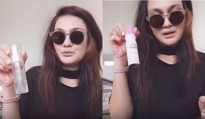 Evian dan SK II Spray masuk dalam isi tas makeup Luna Maya yang tampil cantik saat traveling