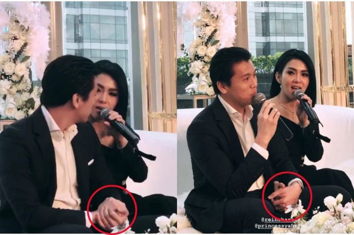 Genggaman tangan Reino Barack pada Syahrini seolah tak mau lepas!