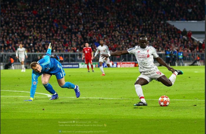 Aksi epik Sadio Mane (kanan) mengecoh Manuel Neuer dalam partai Liga Champions Bayern Muenchen kontra Liverpool, 13 Maret 2019.