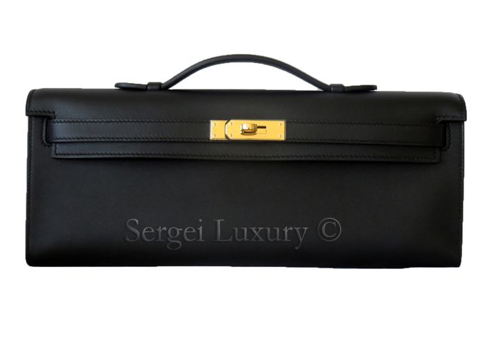 Tas Maia Estianty - Hermes Kelly Cut Clutch bag Black Gold GHW Swift Leather