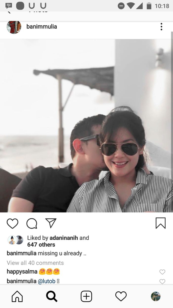 Foto Lulu Tong tampil mesra dengan seorang pria.