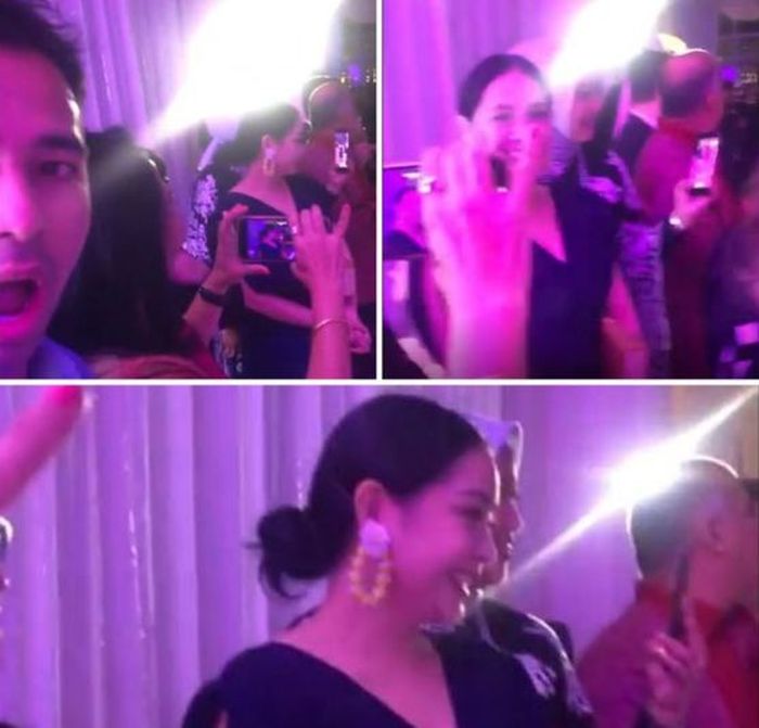 Nagita tampak tertawa kecil saat melihat Syahrini dan Reino memasuki wedding venue
