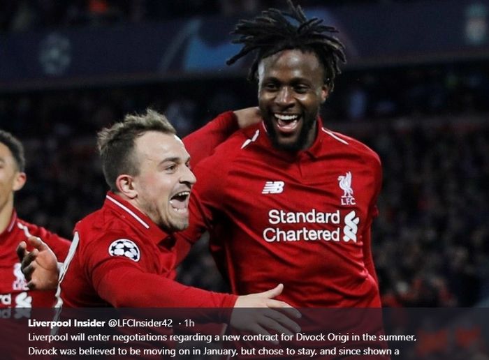 Divock Origi merayakan gol keempat LIverpool bersama Xherdan Shaqiri usai membobol gawang Barcelona