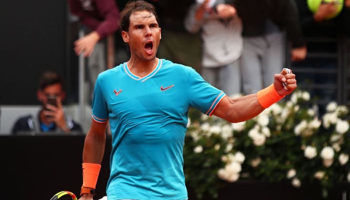 Petenis asal Spanyol, Rafael Nadal saat bertanding pada final Rome Masters 2019, Minggu (19/5/2019)