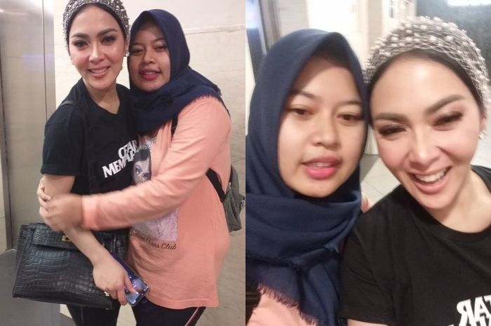 Penampilan Syahrini saat foto bareng fans