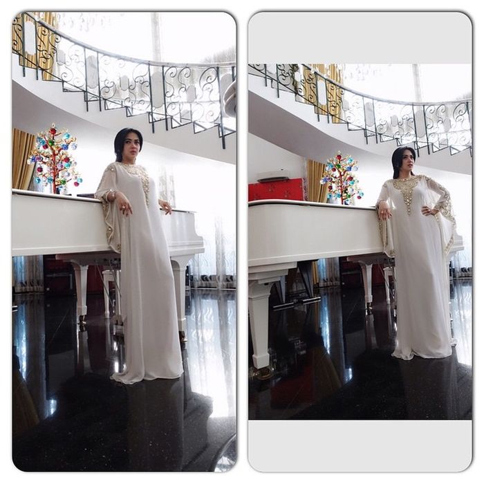 Syahrini terlihat anggun dengan gaya rambut panjang saat pakai kaftan di hari Idul Fitri