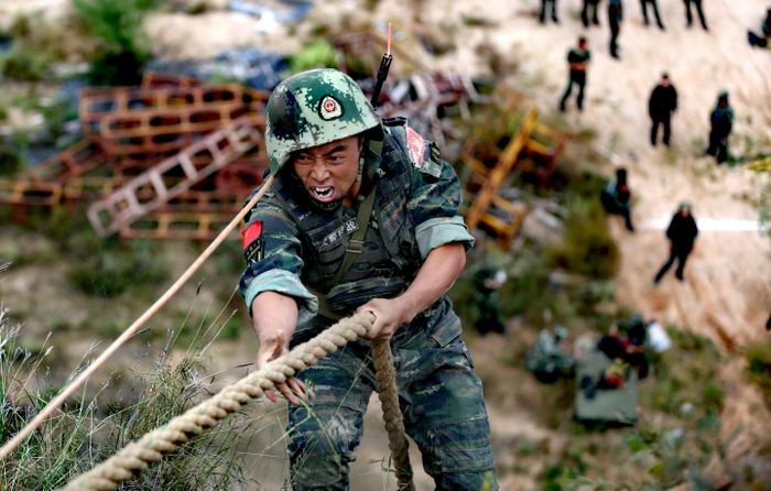 (Ilustrasi) Seorang tentara China sedang melakukan latihan