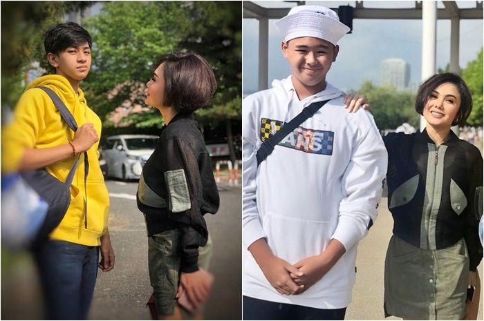 Yuni Shara bersama kedua anaknya, tampil kece dengan jaket bomber transparan dan rok pendek