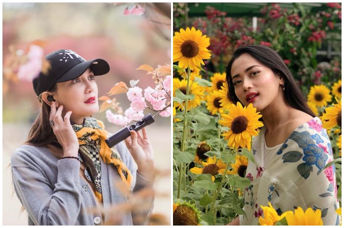 Luna Maya dan Dina Albens berfoto dengan latar bunga