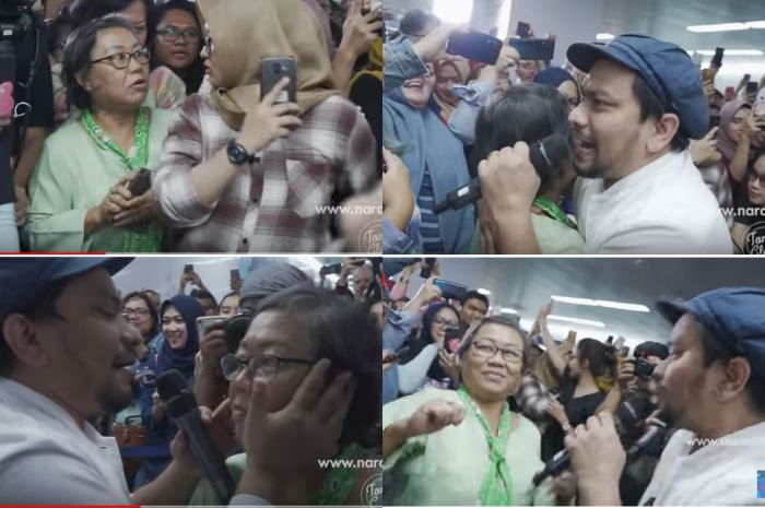 Tompi berusaha melerai seorang wanita yang marah dan nyaris bertengkar