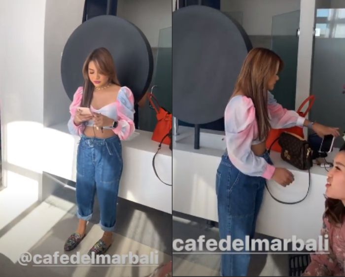 Aurel Hermansyah mengenakan busana crop top multicolor